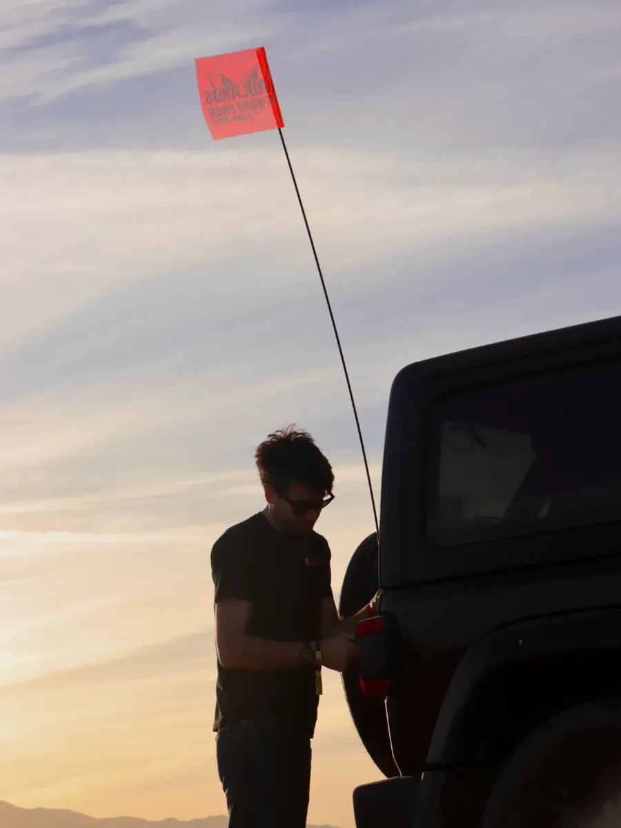 Off-road park at sunset, whip flag up